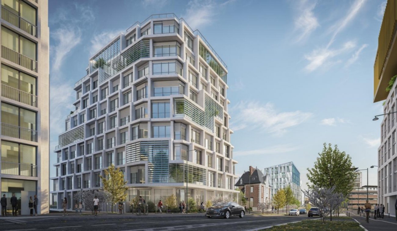 Prix de l’immobilier d’entreprise : Blriot-Nord  Rennes (35) de Bati ArmorArchitectes : Maurer et GilbertPrsentation :Situ au cœur du projet Euro-Rennes, le futur sige de Samsic se distingue par son implantation surleve offrant des vues dgages depuis le Pont de l’Alma. Compos de deux btiments relis par un atrium vitr, il prsente des faades en gradins, des terrasses vgtalises et un bton blanc prfabriqu inspir des Horizons de Georges Maillols. La rhabilitation de l’ancien octroi de Chtillon valorise le patrimoine existant. Entre modernit et audace architecturale, ce projet reflte les valeurs sociales et environnementales de l’entreprise tout en s’insrant harmonieusement dans le tissu urbain rennais.